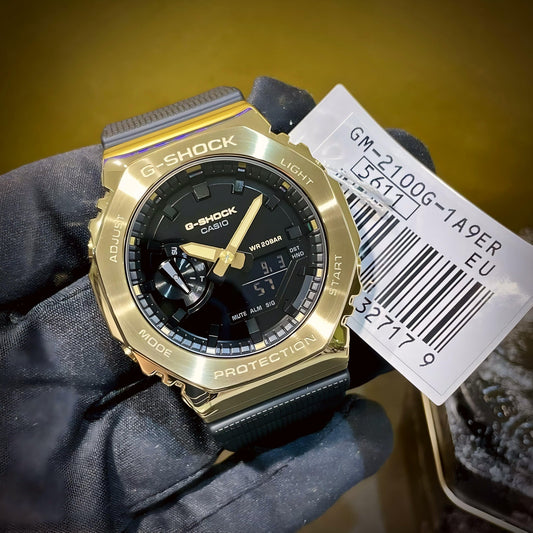 G-SHOCK GM-2100 GOLD BLACK DIAL METAL BODY