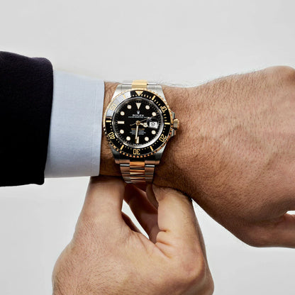 Rolex Sea-Dweller yellow gold Bezel and black dial comInline Delivery Info